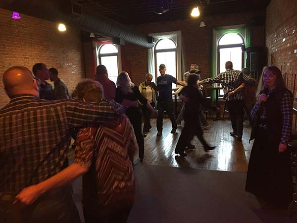 Loretta McKinney calling a Square Dance